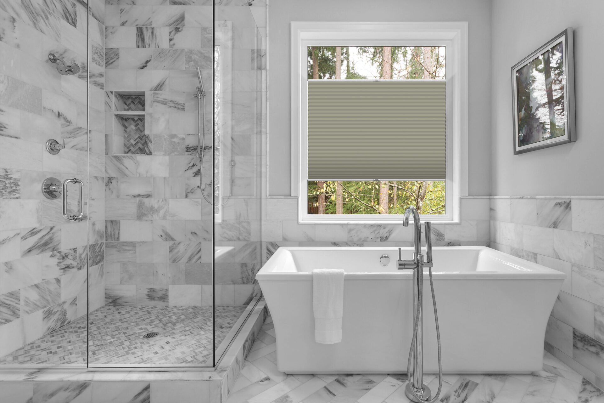 Bathroom with bathtub and shower in new luxury home with all gla