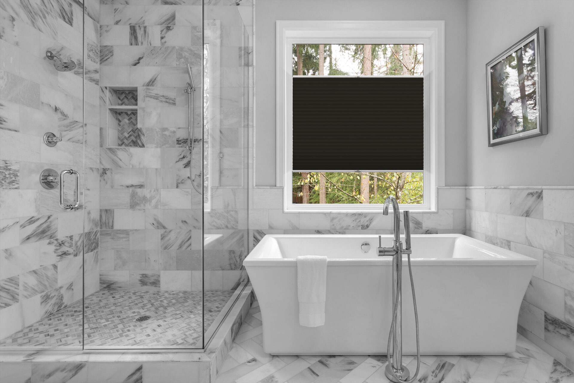 Bathroom with bathtub and shower in new luxury home with all gla